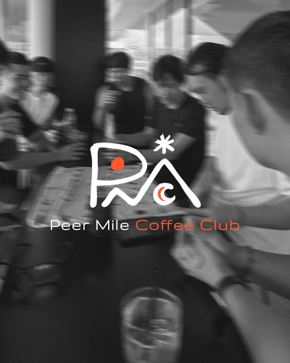 Original PMCC coffee-club artwork: the hand-drawn white and orange logo over a softly blurred black-and-white café gathering.